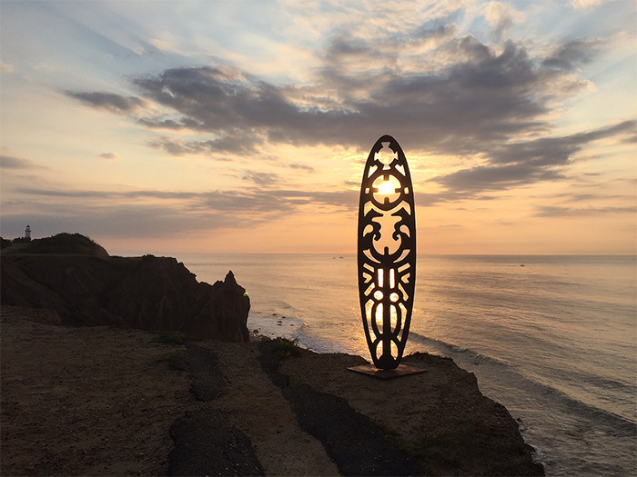 sculpture with sunset